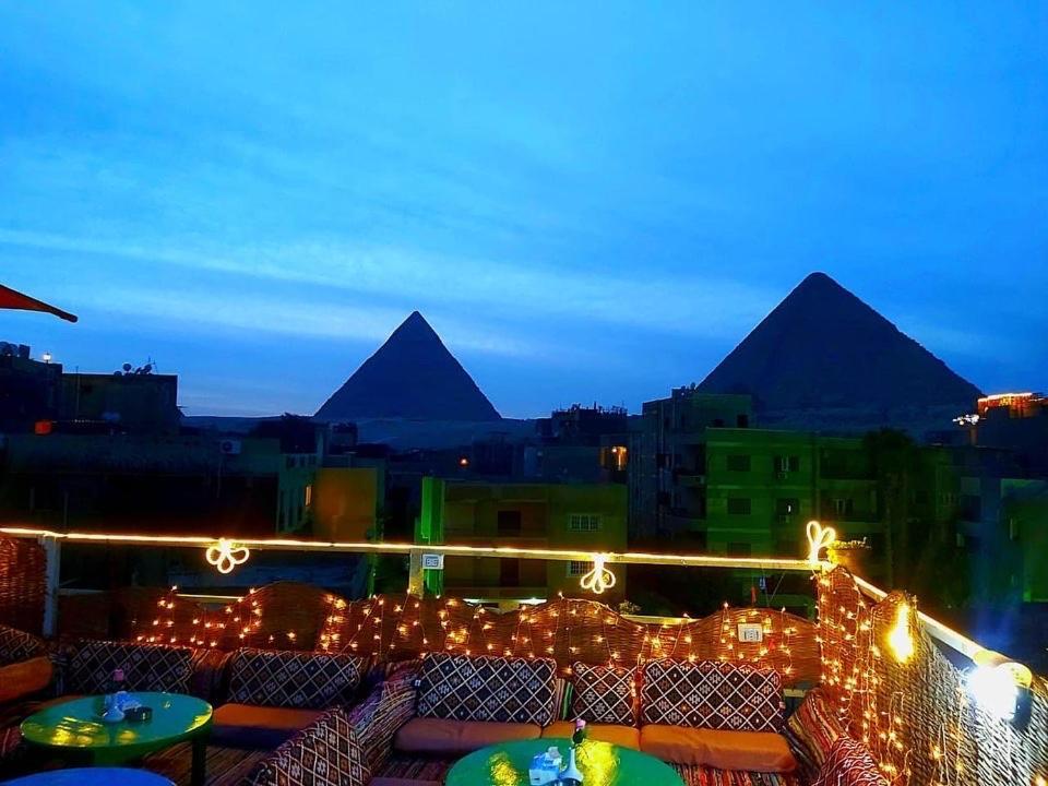 Carpet Alaadein Pyramids View Hotel Kafrat al Jabal Bagian luar foto